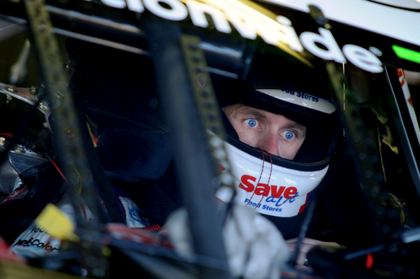 NASCAR driver Carl Edwards prepares for practice. This picture was taken through the windshield.